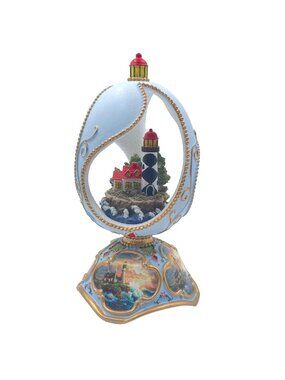Thomas Kinkade "Rocky Shores" Lighthouse Carved Egg Figurine Music Box